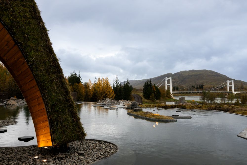 Laugaras lagoon geothermal pool Laugaras lagoon geothermal pool and the white bridge in south Iceland.