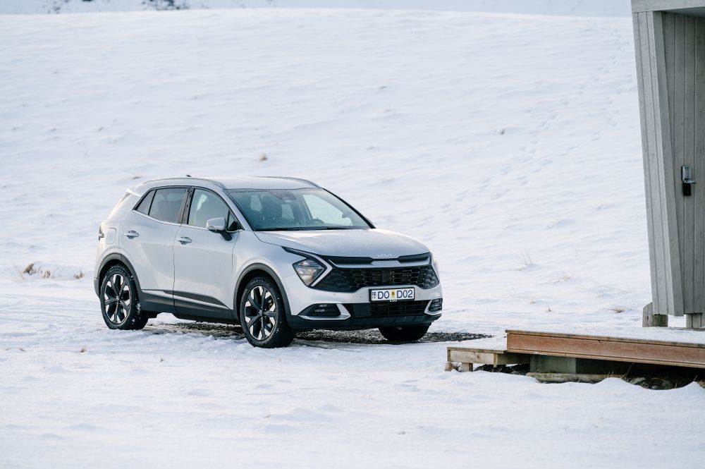 Kia Sportage blue car rental Kia Sportage rental car from Blue car rental in winter.