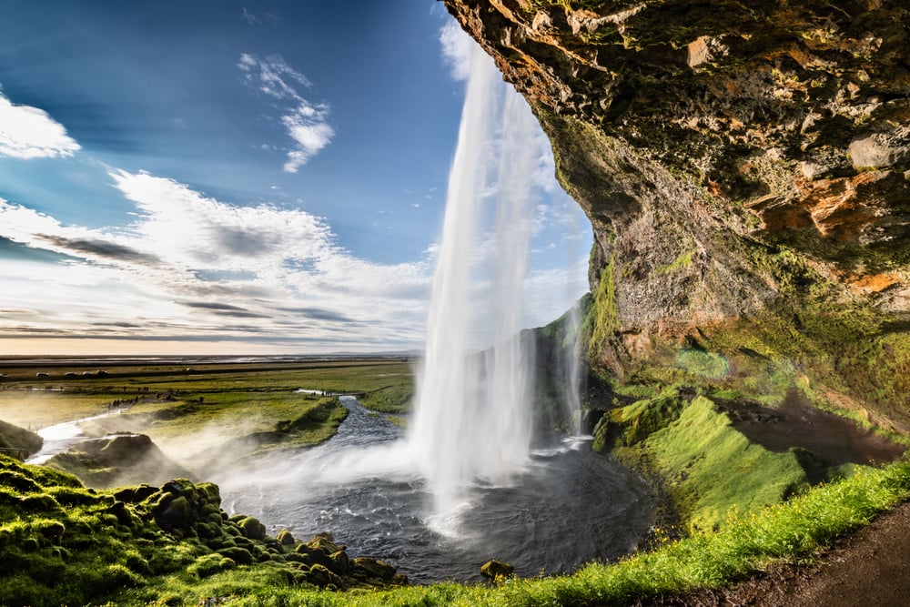 Seljalandsfoss waterfall. Seljalandsfoss view for behind the waterfall.