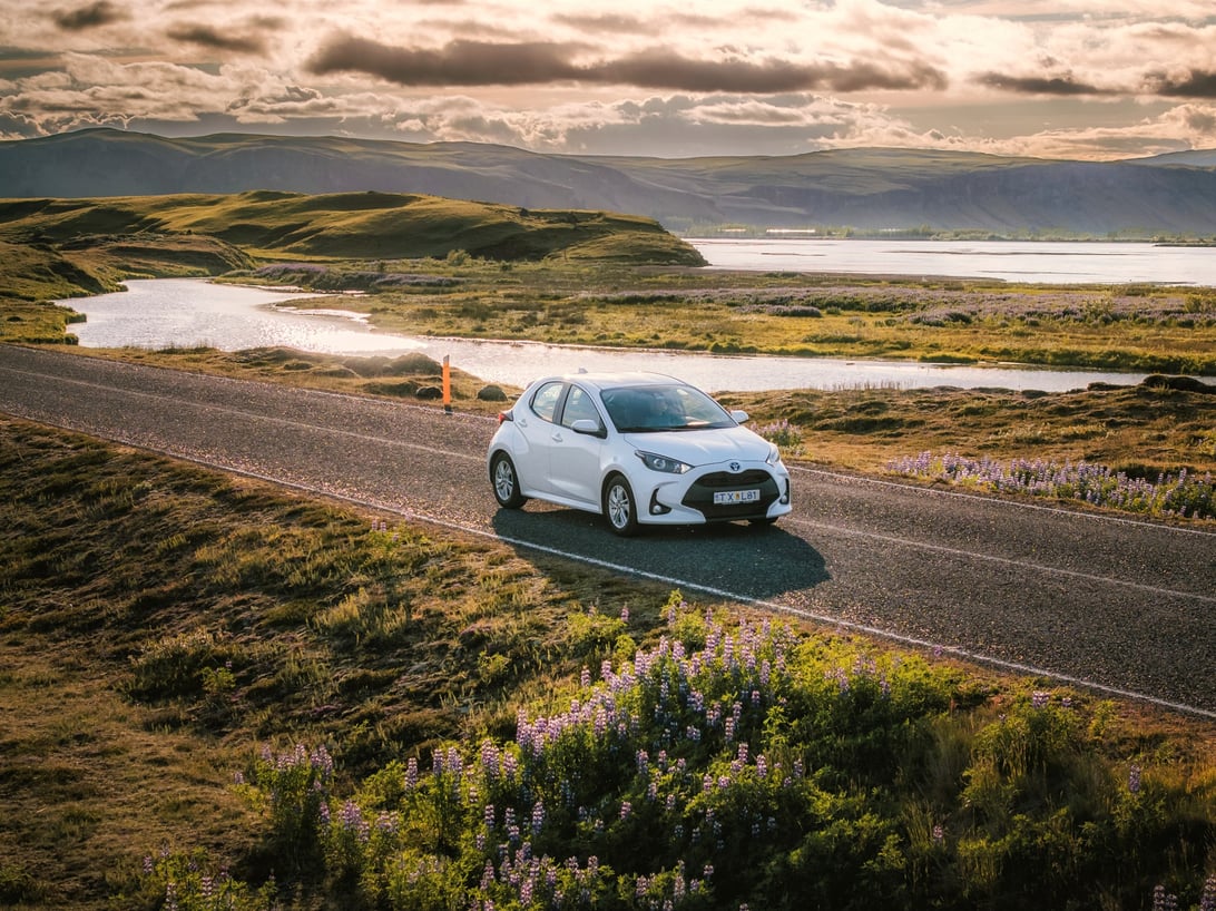 Iceland road in May. Toyota Yaris rental car Iceland summer.