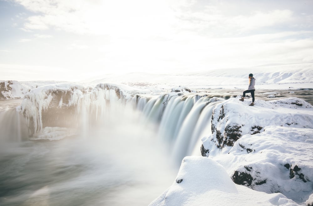 Iceland winter waterfall. Frozen waterfall in Iceland.