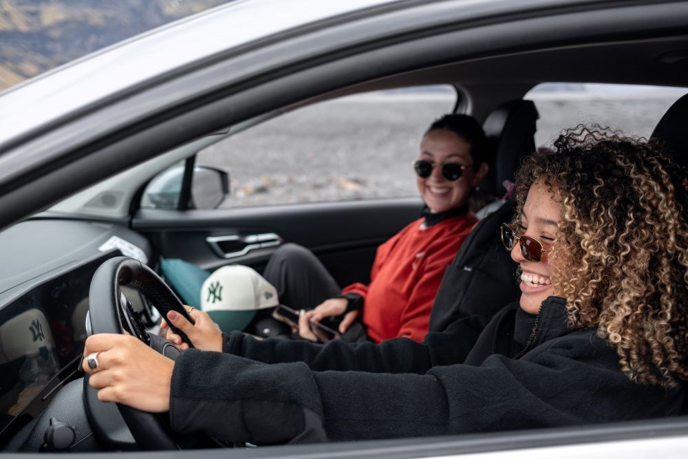 Happy car rental customers in Iceland