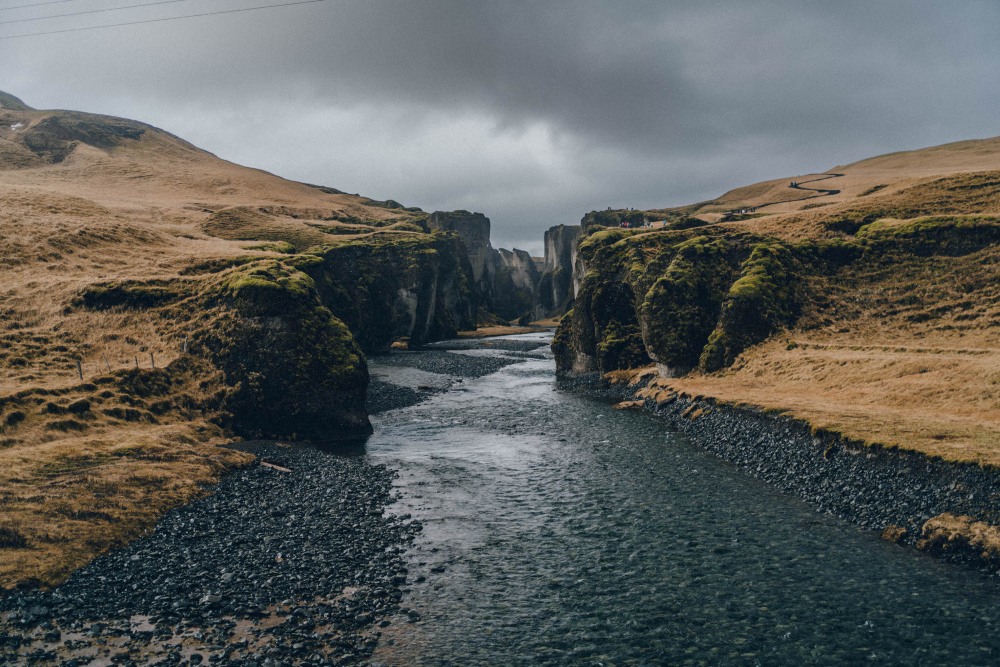 Fjaðrárgljúfur canyon opening end. Opening cliffs of Fjaðrárgljúfur canyon in south Iceland.