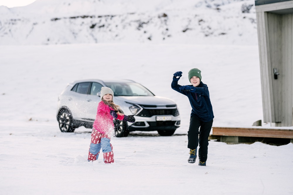 Iceland kids snow. Kids playing in the snow in Iceland.