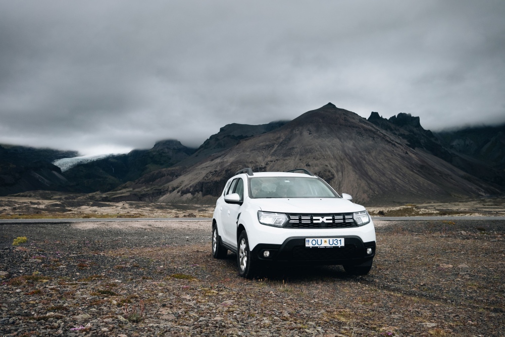 4x4 in Iceland's highland. White Dacia Duster 4x4 in Iceland's highland.