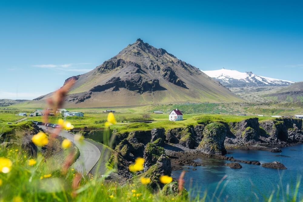 Arnarstapi and snæfellsjökull glaicer on snæfellsnes peninsula iceland.