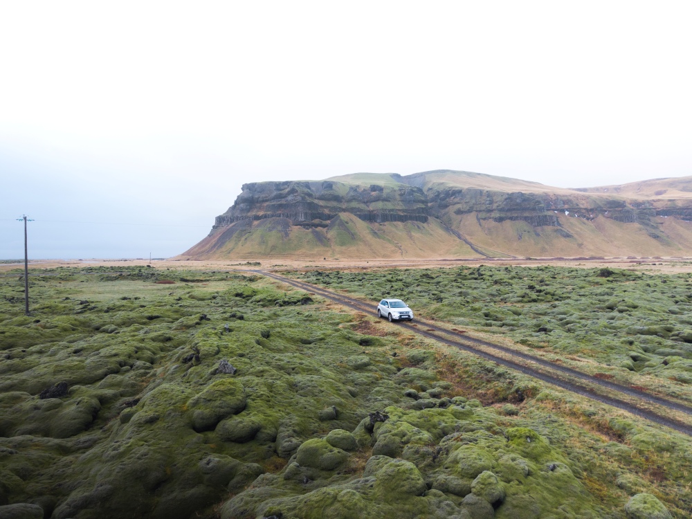 Iceland gravel road. Silver Suzuki Vitara on a gravel road in Iceland in summer.