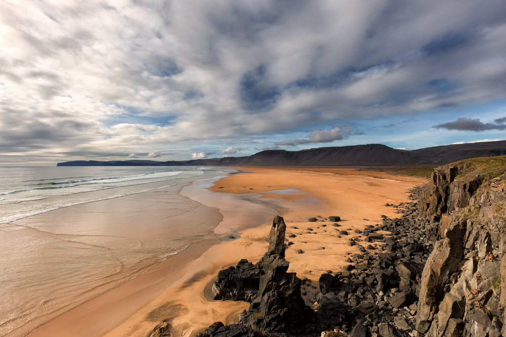 Raudisandur beach. Raudisandur beach red sand.